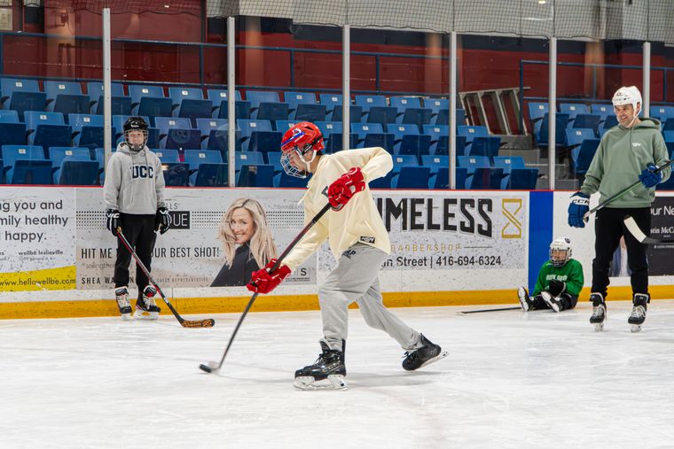 A camper winding up to shoot during a March 2026 camp session
